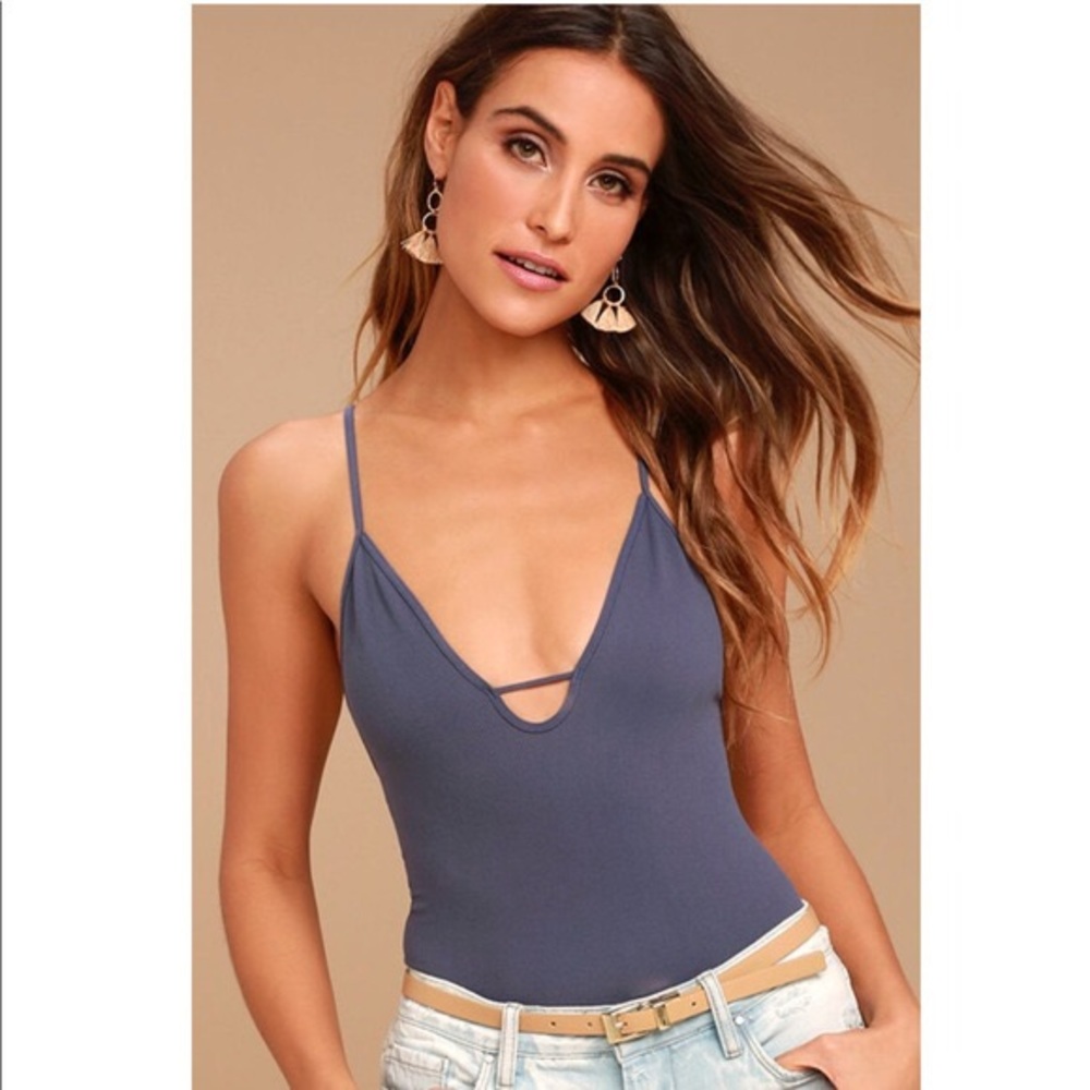 Free people move along purple bodysuit
